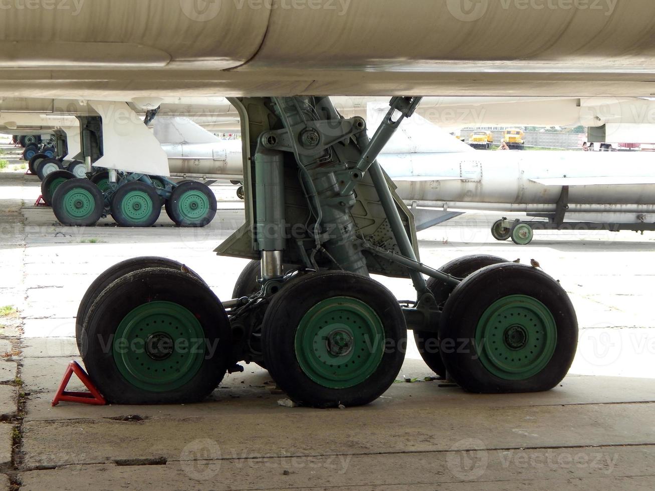 Aviation chassis of an airplane and a helicopter at the airport photo