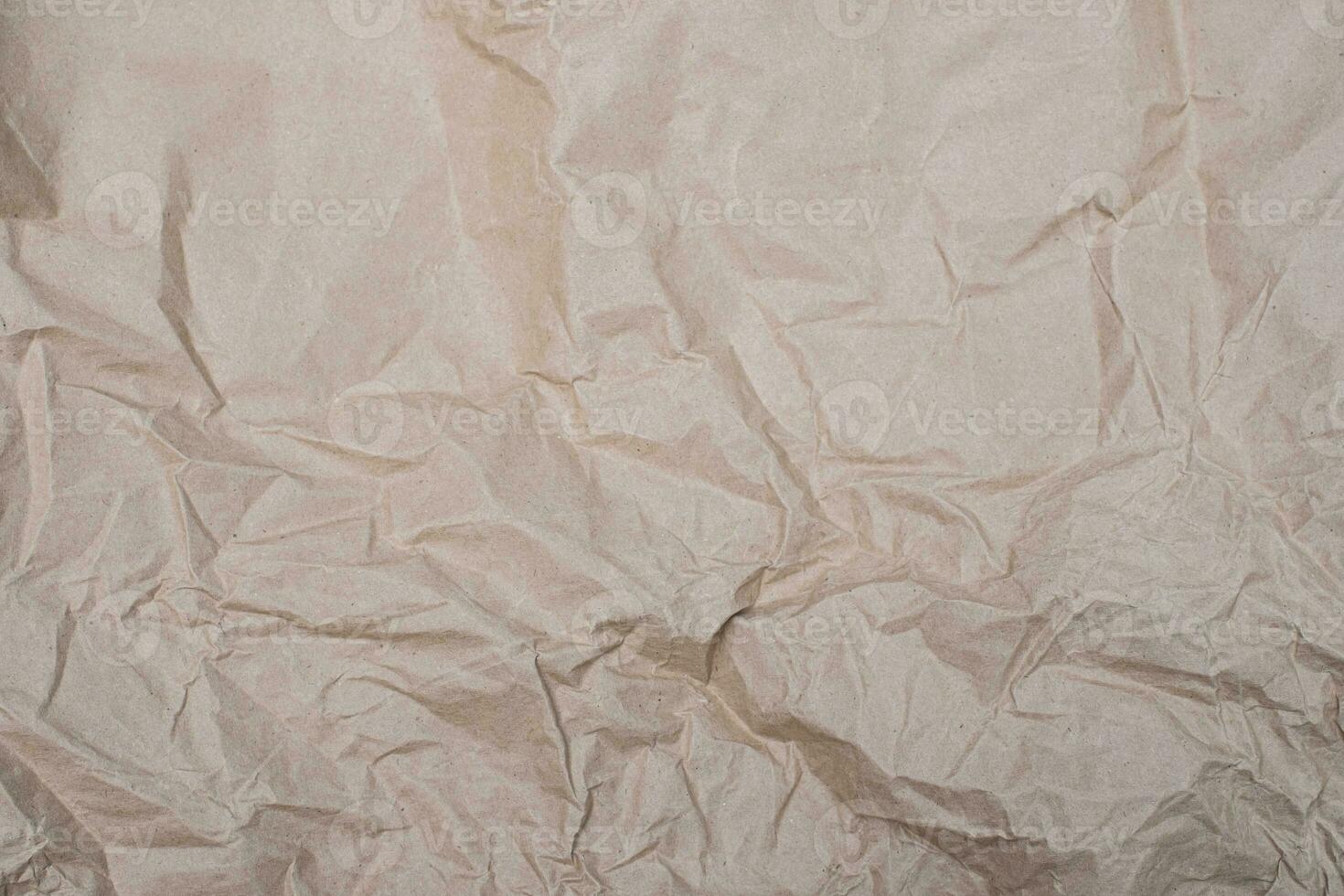 Close up crumpled creased paper old texture background photo