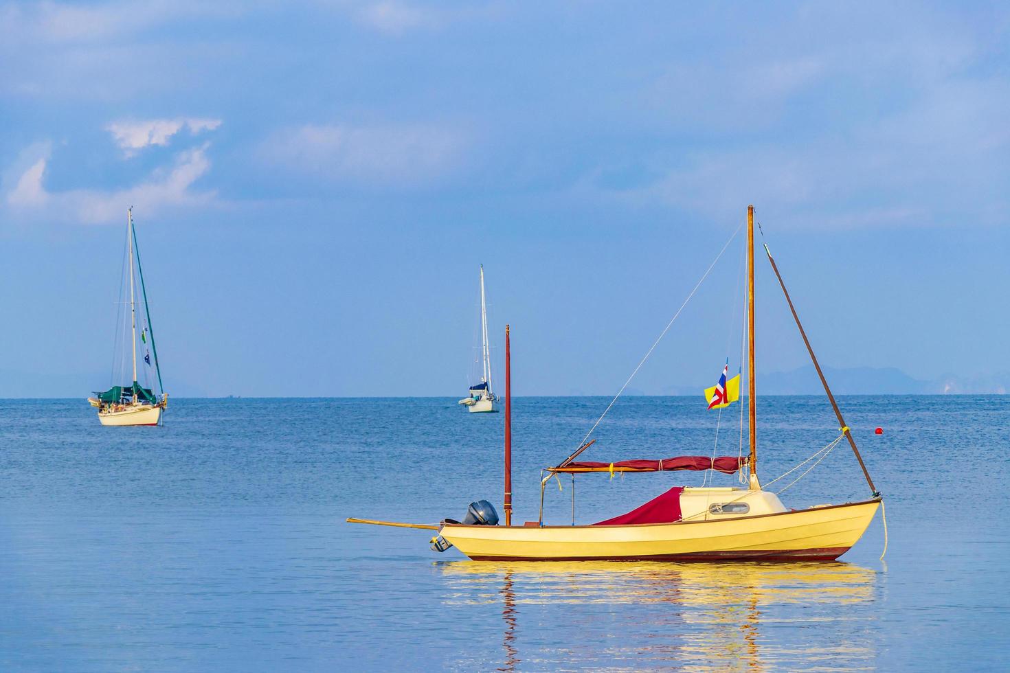 Boats tropical island Koh Phayam Ao Khao Kwai Beach Thailand photo