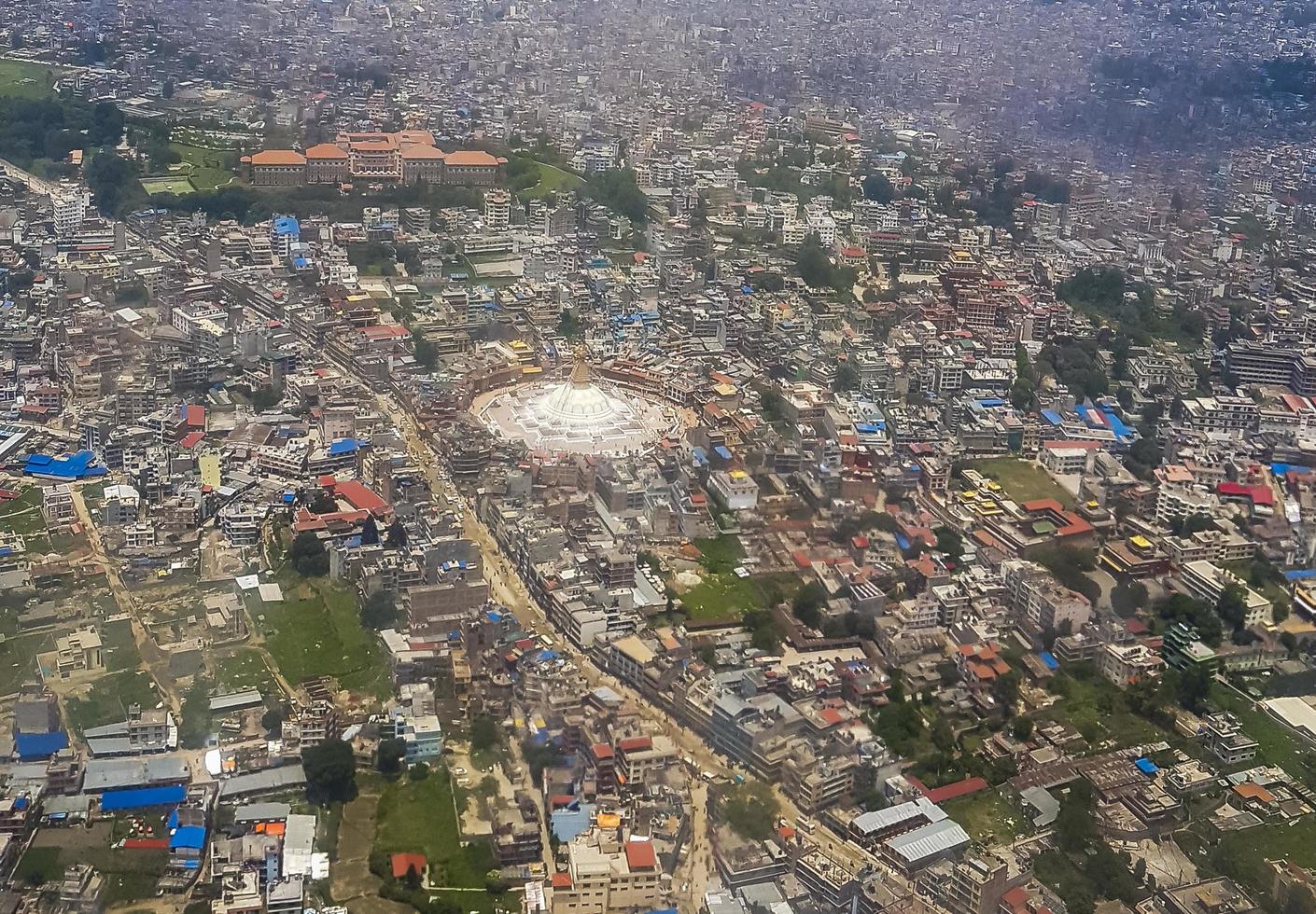 Kathmandu Nepal panorama seen from above through the airplane window photo