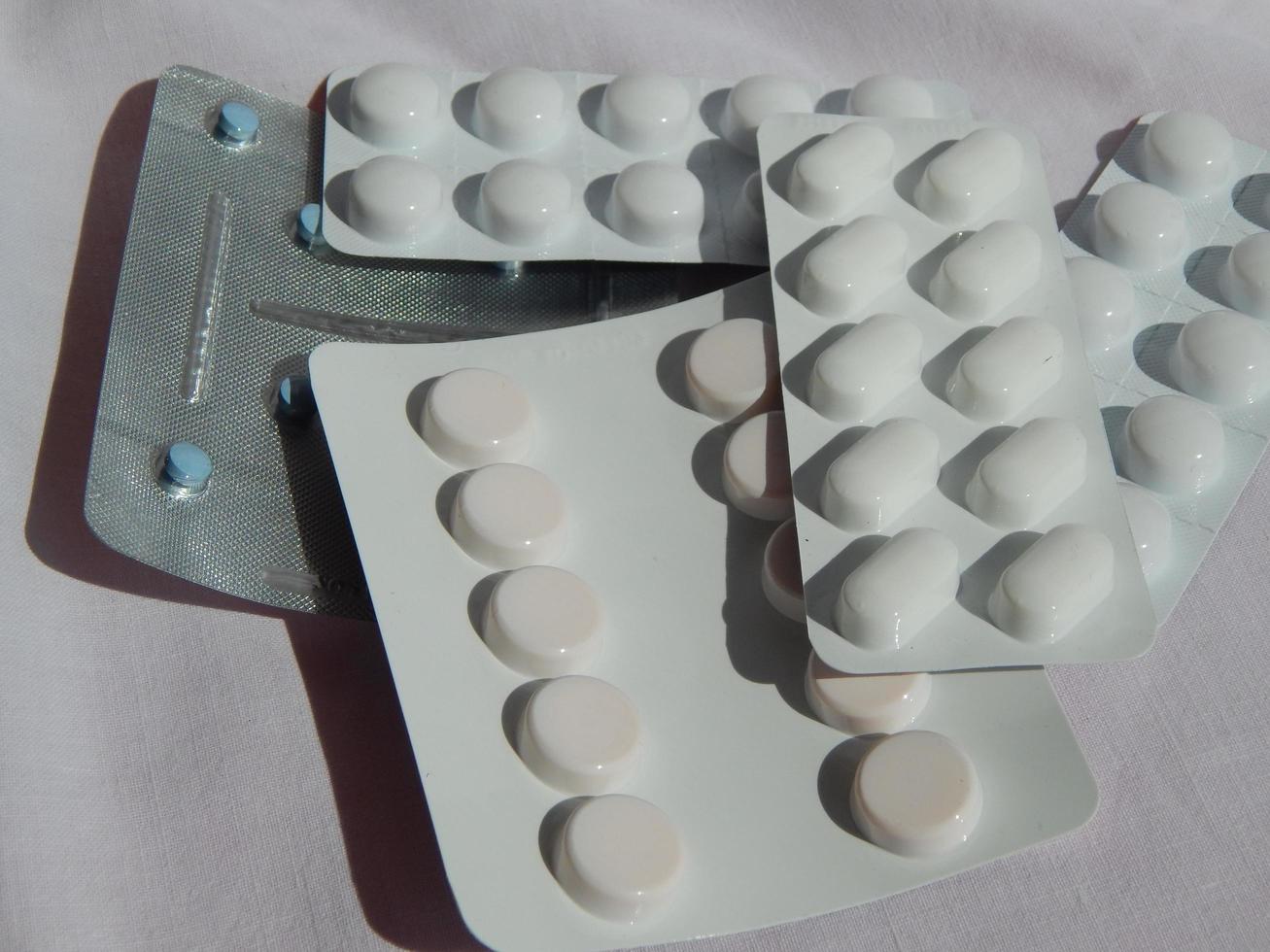 Medicine doctor gown and pills photo