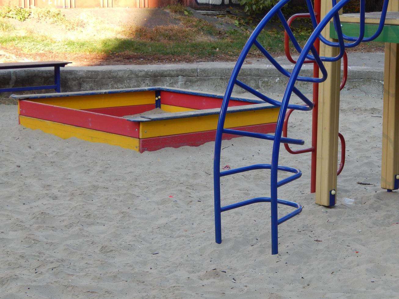 Children playground, swing near the house photo