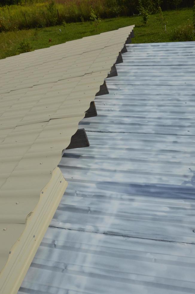 Roof painting with enamel paint from an aerosol can photo