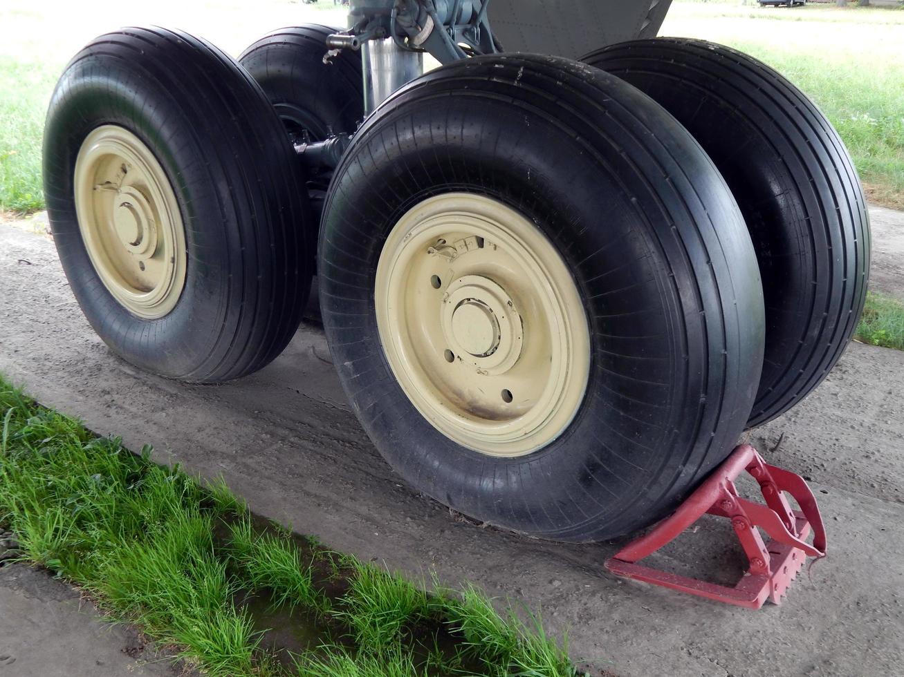 Aviation chassis of an airplane and a helicopter at the airport photo