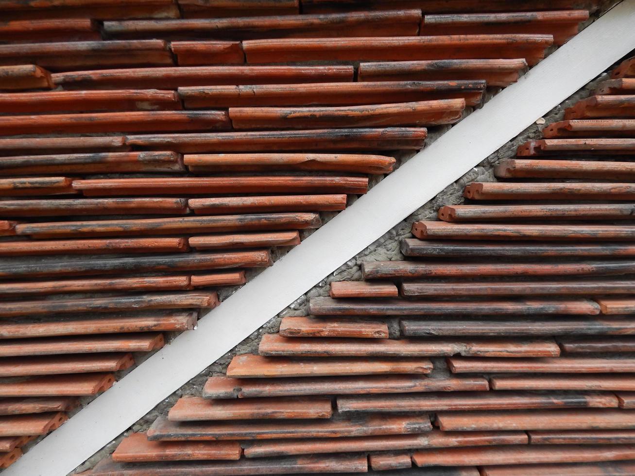 Textura de una pared de un edificio de una colocación de piedra foto