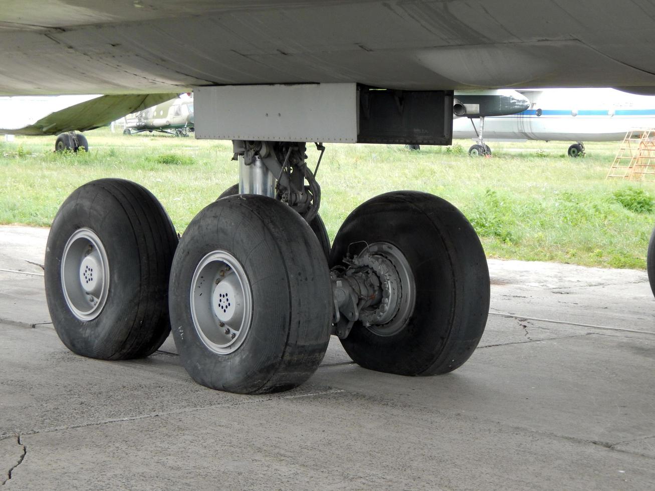 Aviation chassis of an airplane and a helicopter at the airport photo