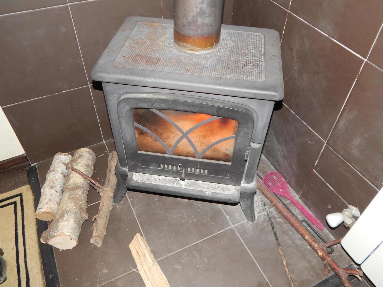 Installing a wood burning stove, chimney photo