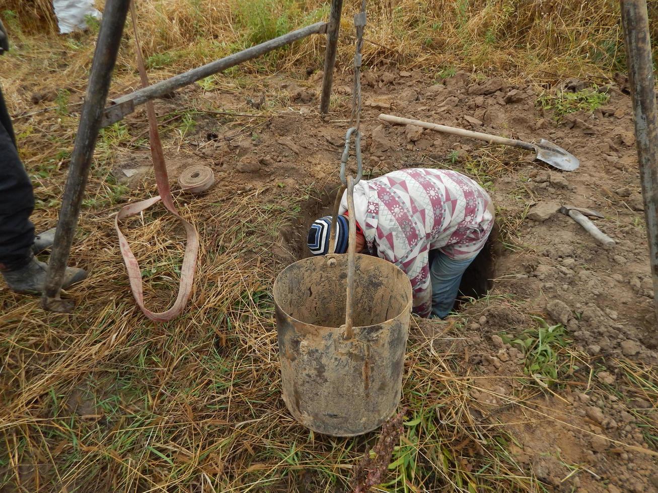 Construction of a drinking well at the dacha photo