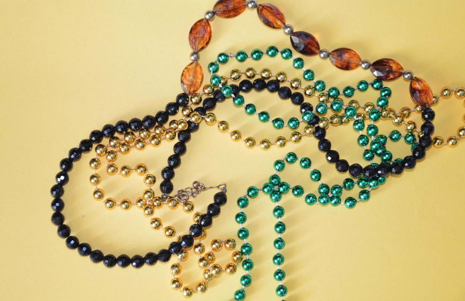 Multicolored beads as an isolated object on a background photo