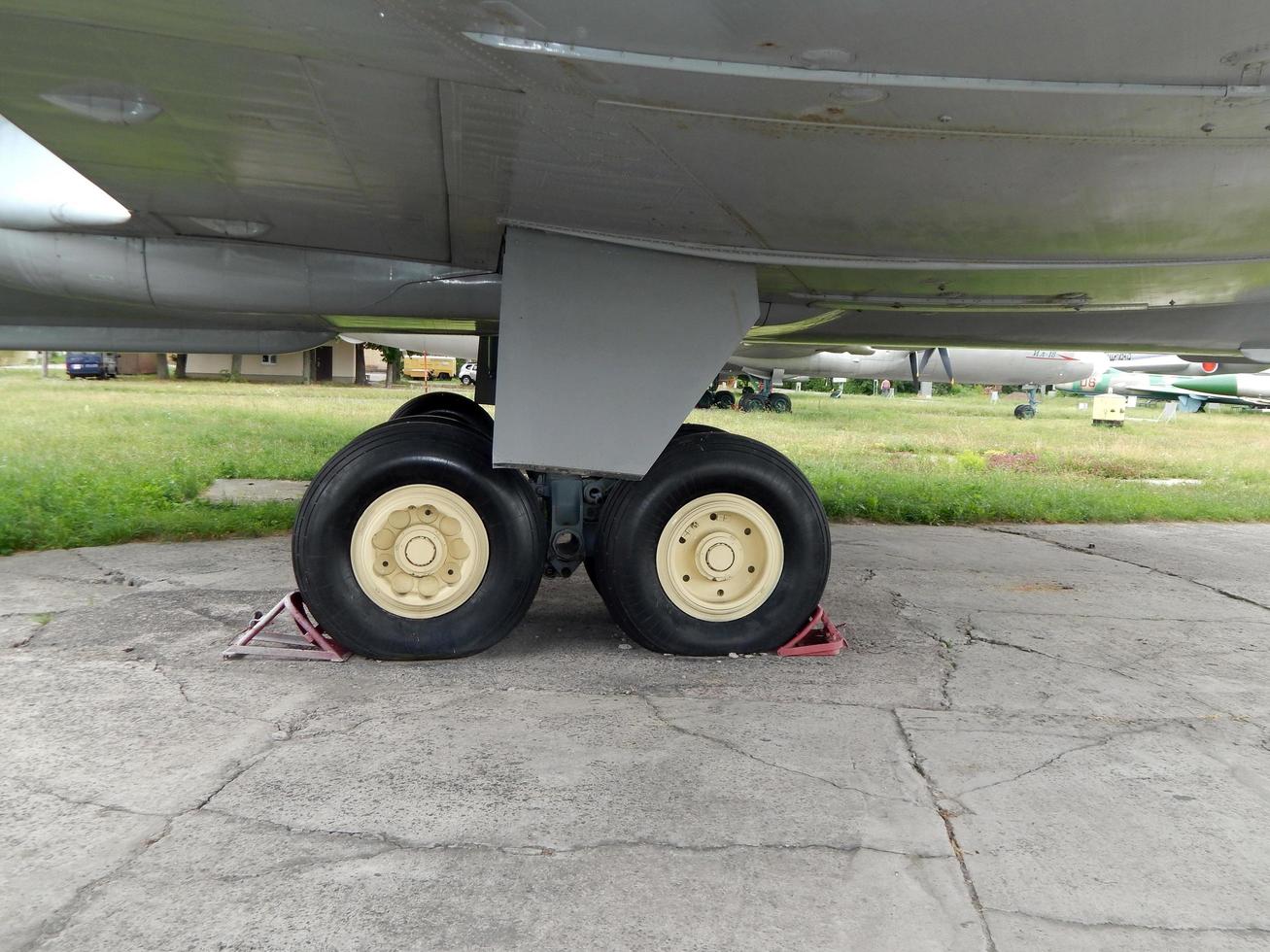 Aviation chassis of an airplane and a helicopter at the airport photo