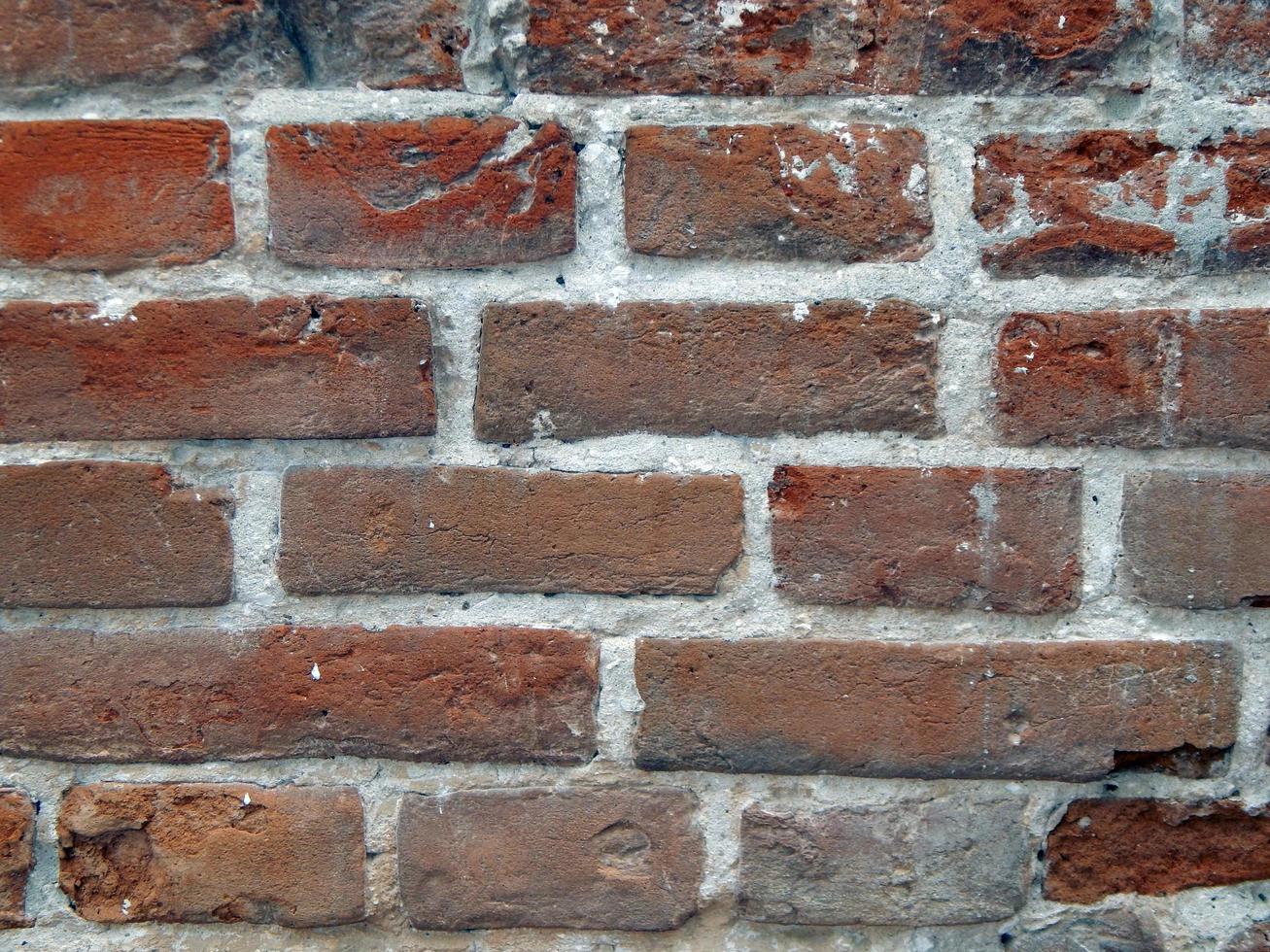 Texture of natural stone material and brick masonry walls photo