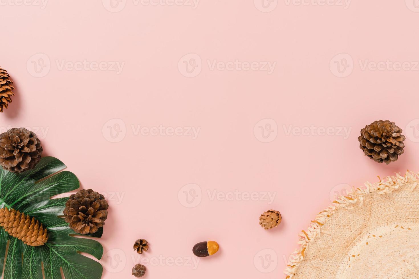 Creative flat lay photo of travel vacation spring or summer tropical fashion. Top view beach accessories on pastel pink color background with blank space for text. Top view copy space photography.