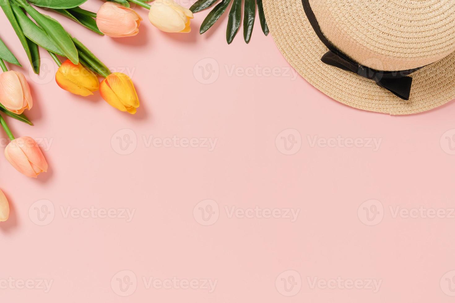 Creative flat lay photo of travel vacation spring or summer tropical fashion. Top view beach accessories on pastel pink color background with blank space for text. Top view copy space photography.