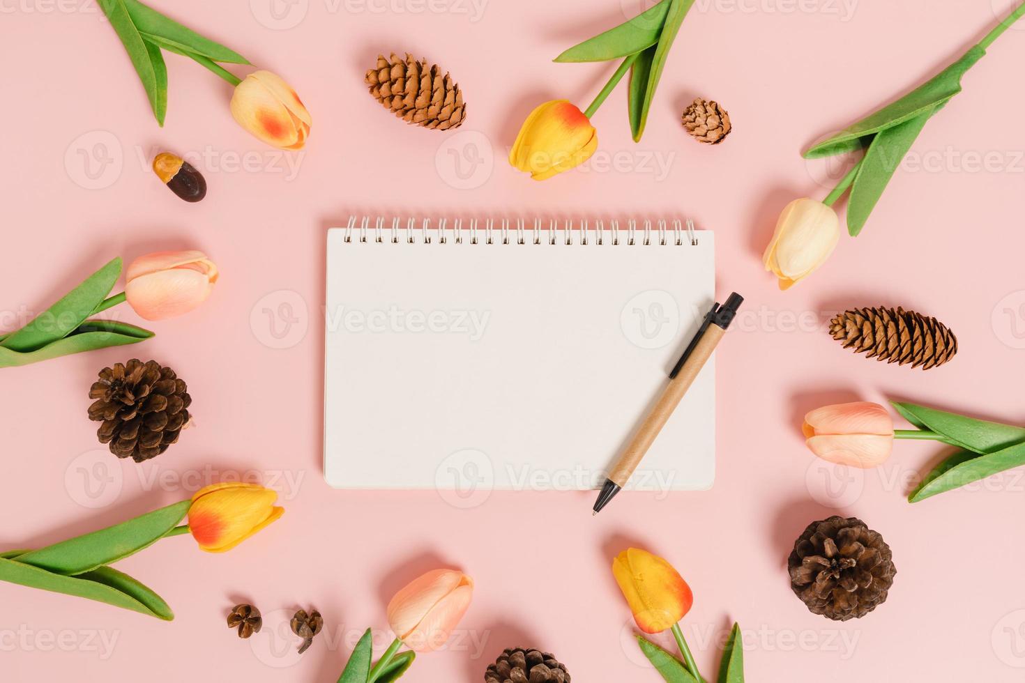 Creative flat lay of travel vacation spring or summer tropical fashion. Top view beach accessories open mockup black notebook for text on pastel background. Top view mock up copy space photography. photo
