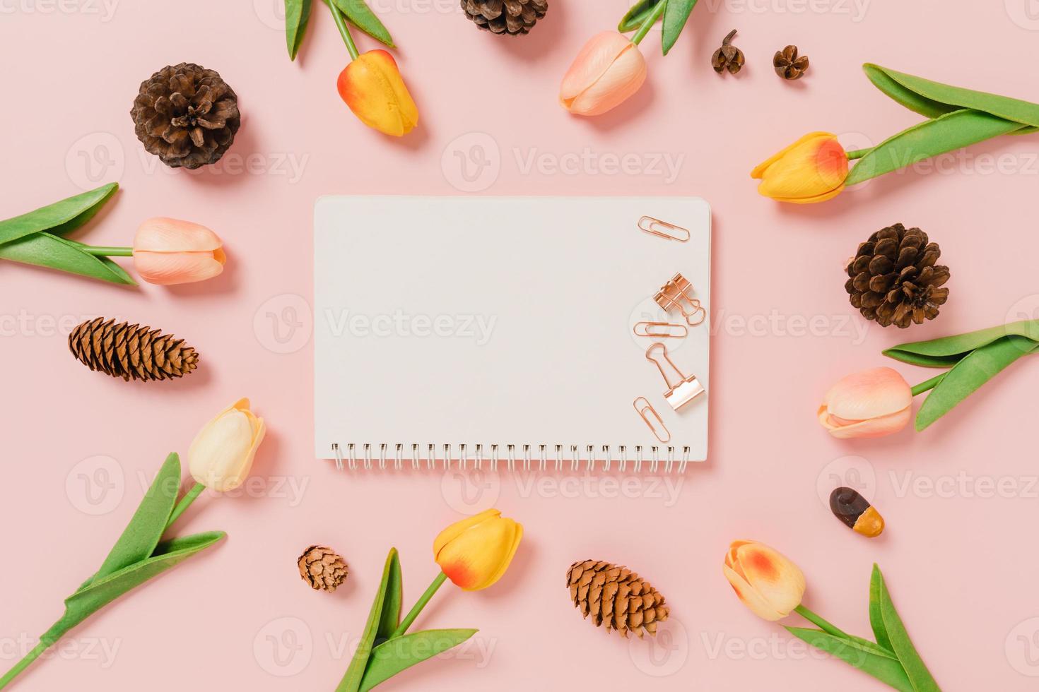 Creative flat lay of travel vacation spring or summer tropical fashion. Top view beach accessories open mockup black notebook for text on pastel background. Top view mock up copy space photography. photo