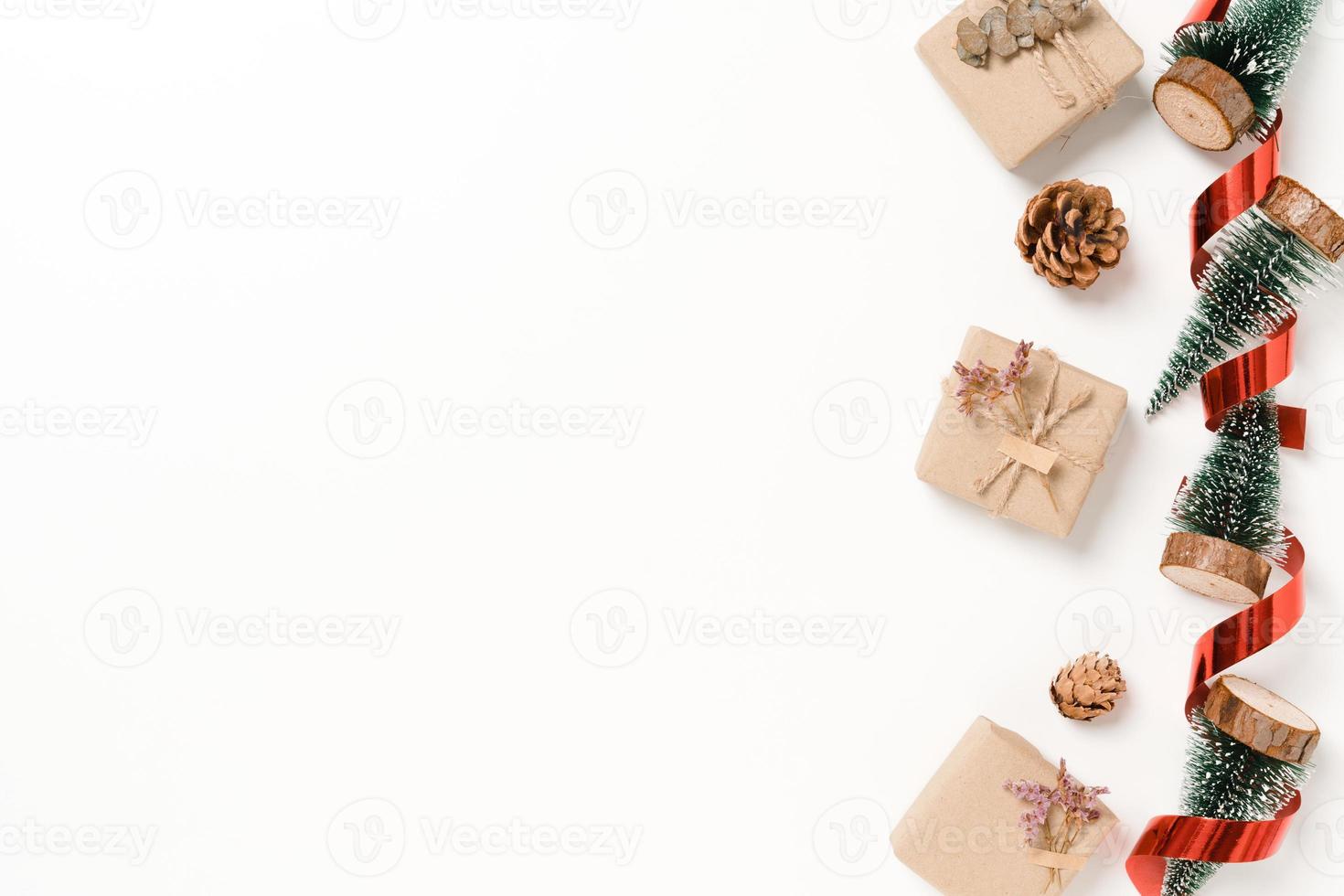 Minimal creative flat lay of christmas traditional composition and new year holiday season. Top view winter christmas decorations on white background with blank space for text. Copy space photography. photo