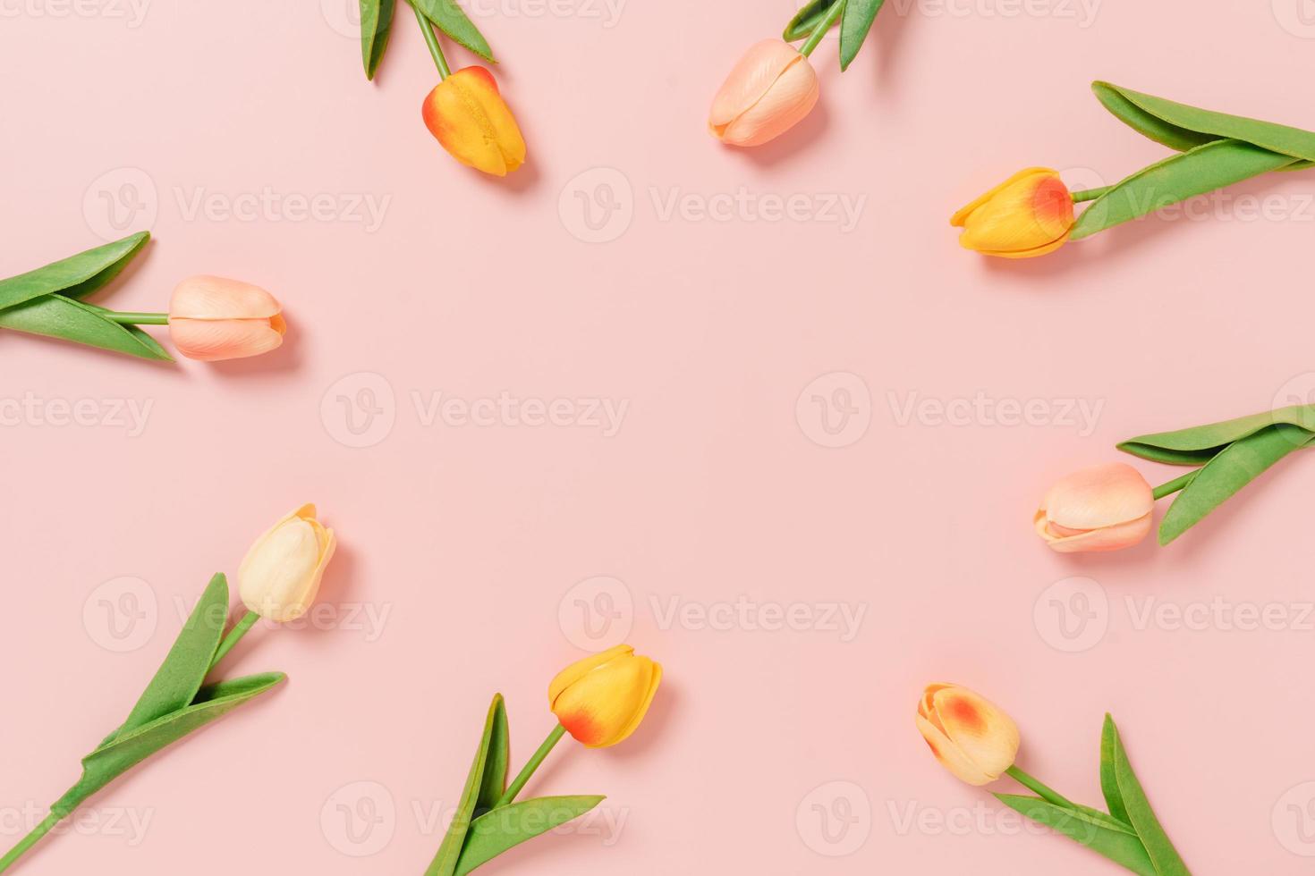 Creative flat lay photo of travel vacation spring or summer tropical fashion. Top view beach accessories on pastel pink color background with blank space for text. Top view copy space photography.