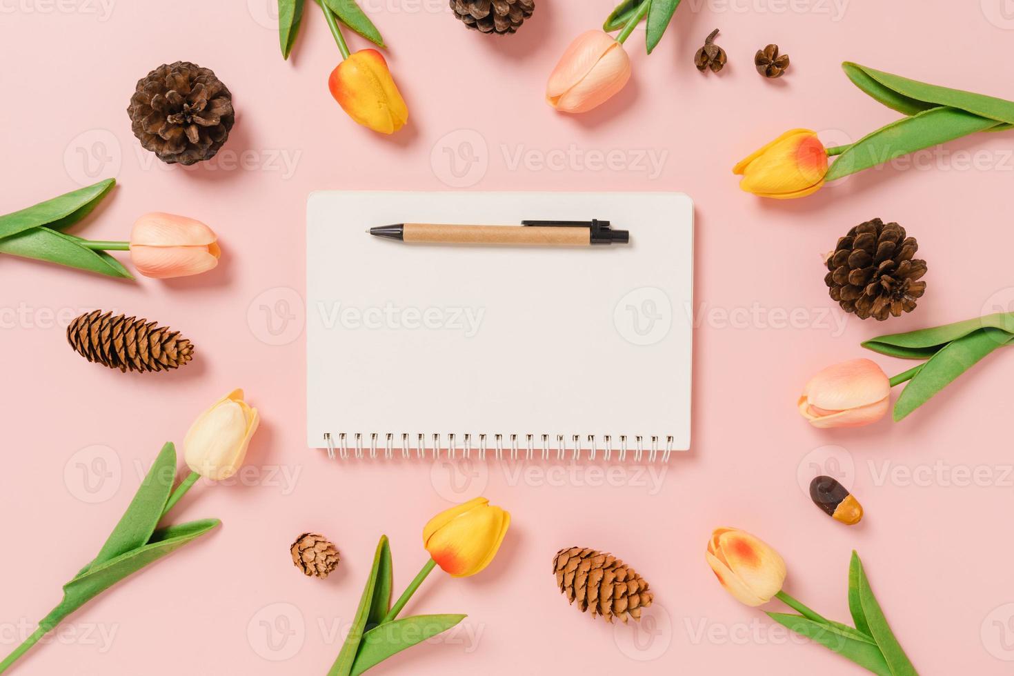 Creative flat lay of travel vacation spring or summer tropical fashion. Top view beach accessories open mockup black notebook for text on pastel background. Top view mock up copy space photography. photo