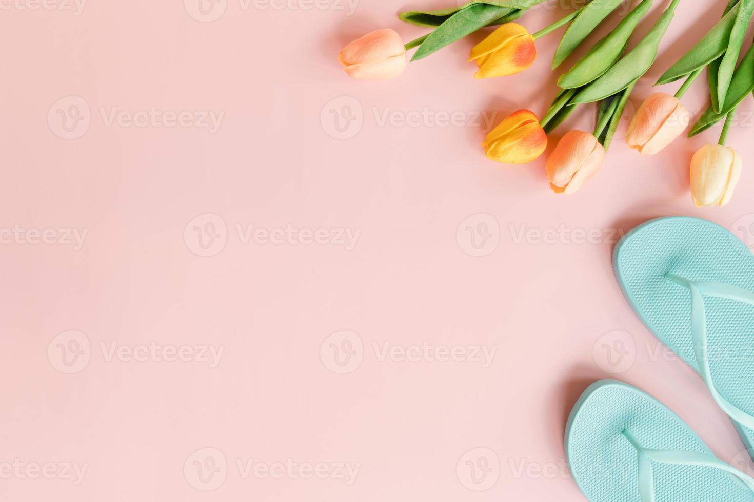 Creative flat lay photo of travel vacation spring or summer tropical fashion. Top view beach accessories on pastel pink color background with blank space for text. Top view copy space photography.