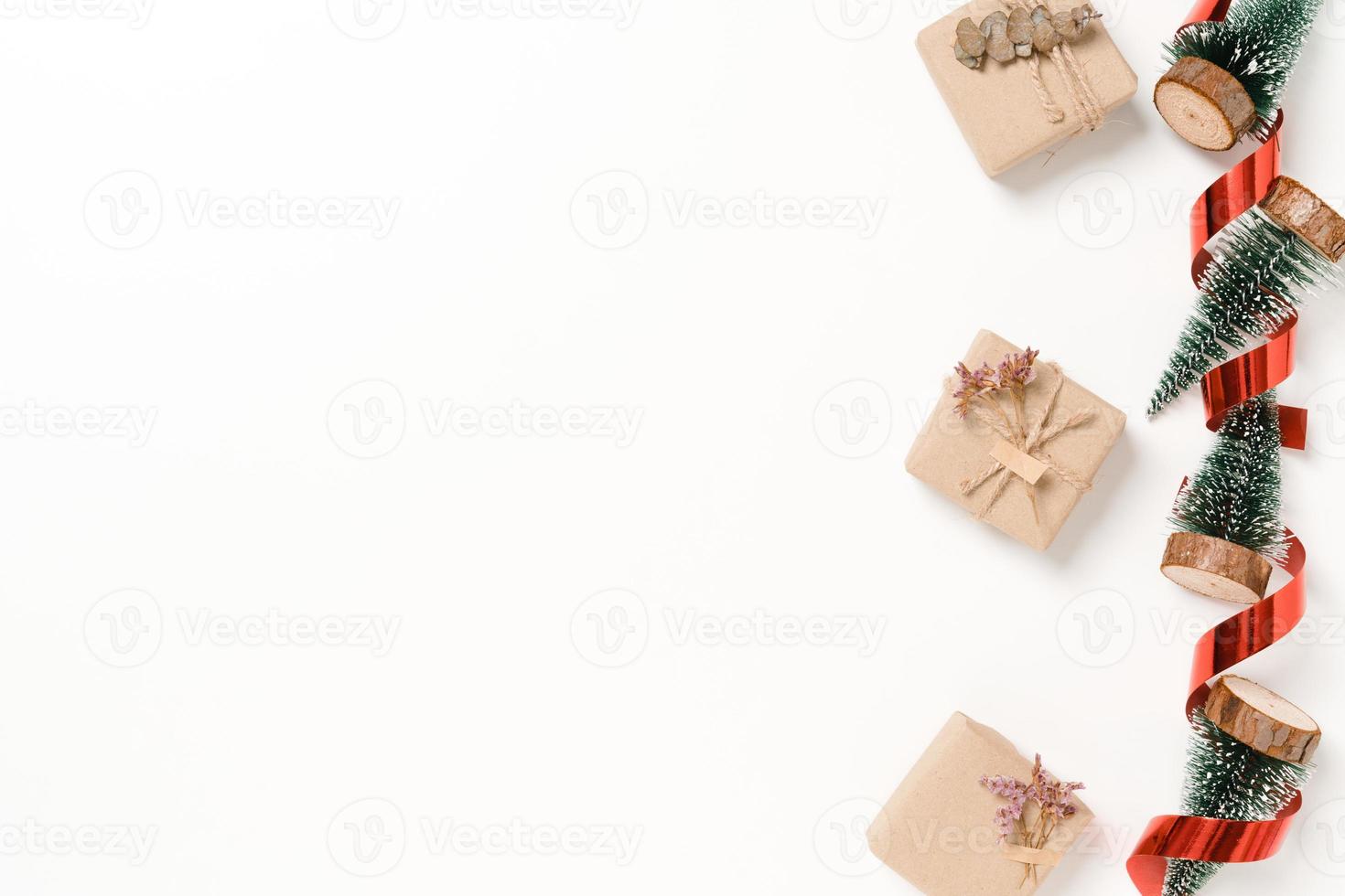 Minimal creative flat lay of christmas traditional composition and new year holiday season. Top view winter christmas decorations on white background with blank space for text. Copy space photography. photo