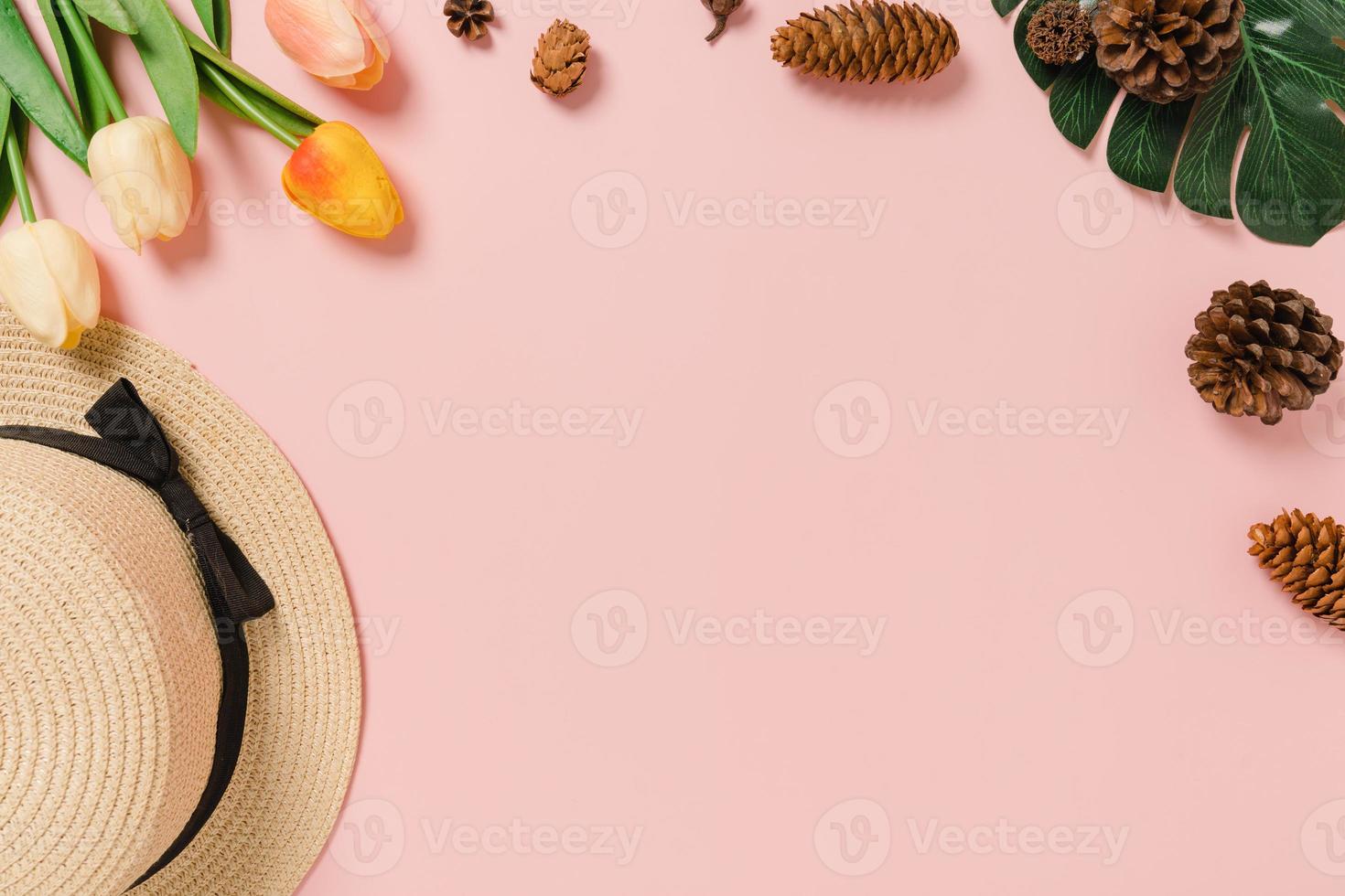 Creative flat lay photo of travel vacation spring or summer tropical fashion. Top view beach accessories on pastel pink color background with blank space for text. Top view copy space photography.