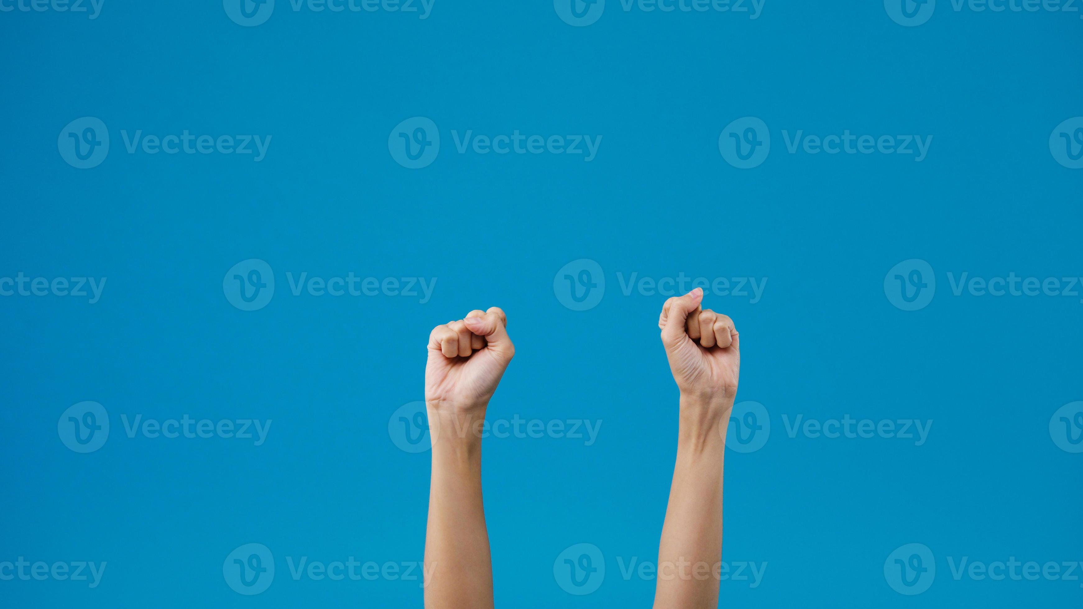 Young woman showing hand palm clenched picture
