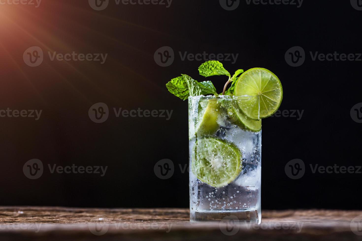 Mojito drink on dark background photo