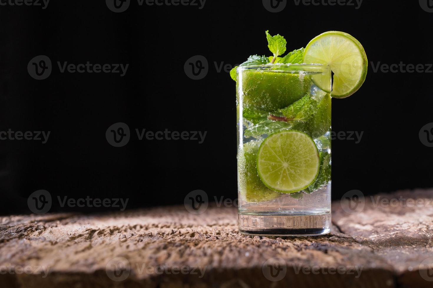 Mojito drink on dark photo