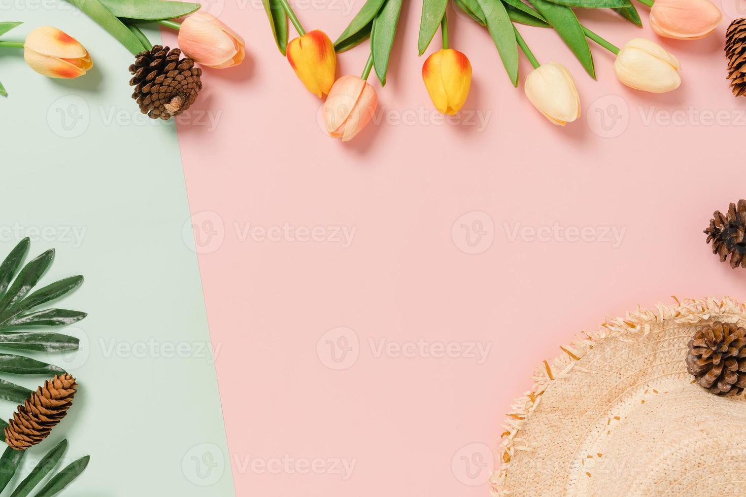 Creative flat lay of travel vacation spring or summer tropical fashion. Top view beach accessories on pastel green pink color background with blank space for text. Top view copy space photography. photo