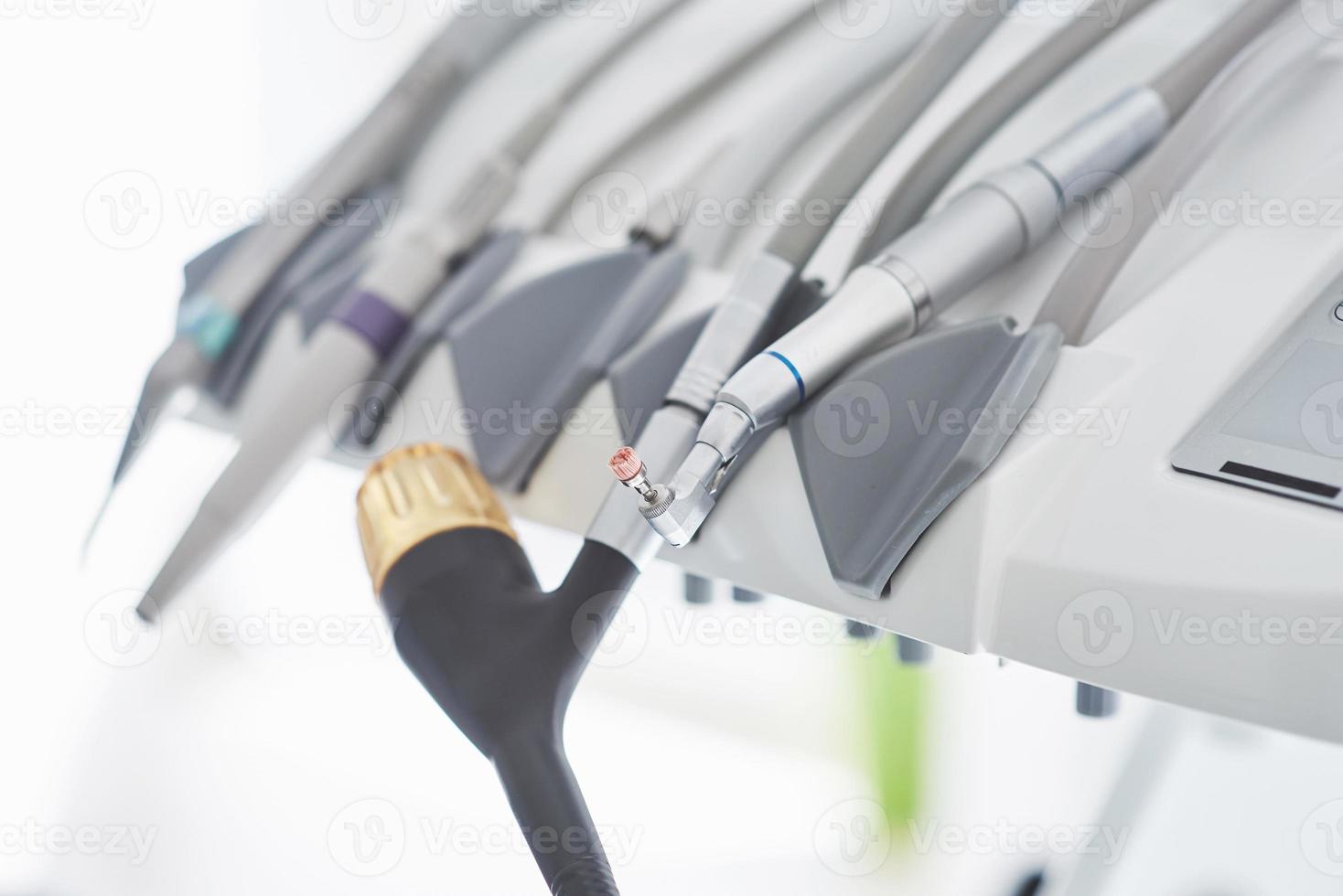 Tools and drills in the dental office. The concept of health and beauty photo