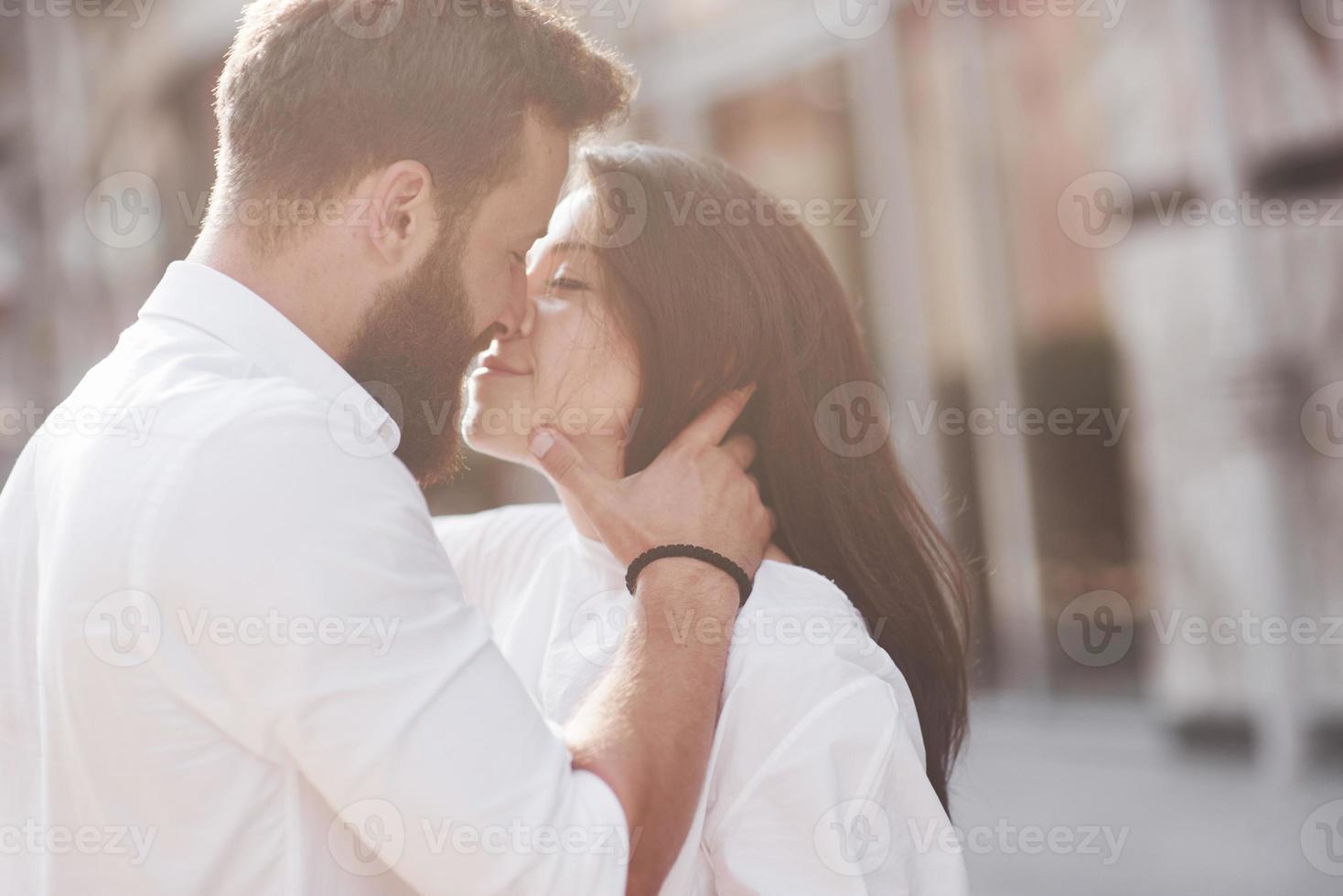 Beautiful happy couple hugging on the city street.Lifestyle concept love and romance photo