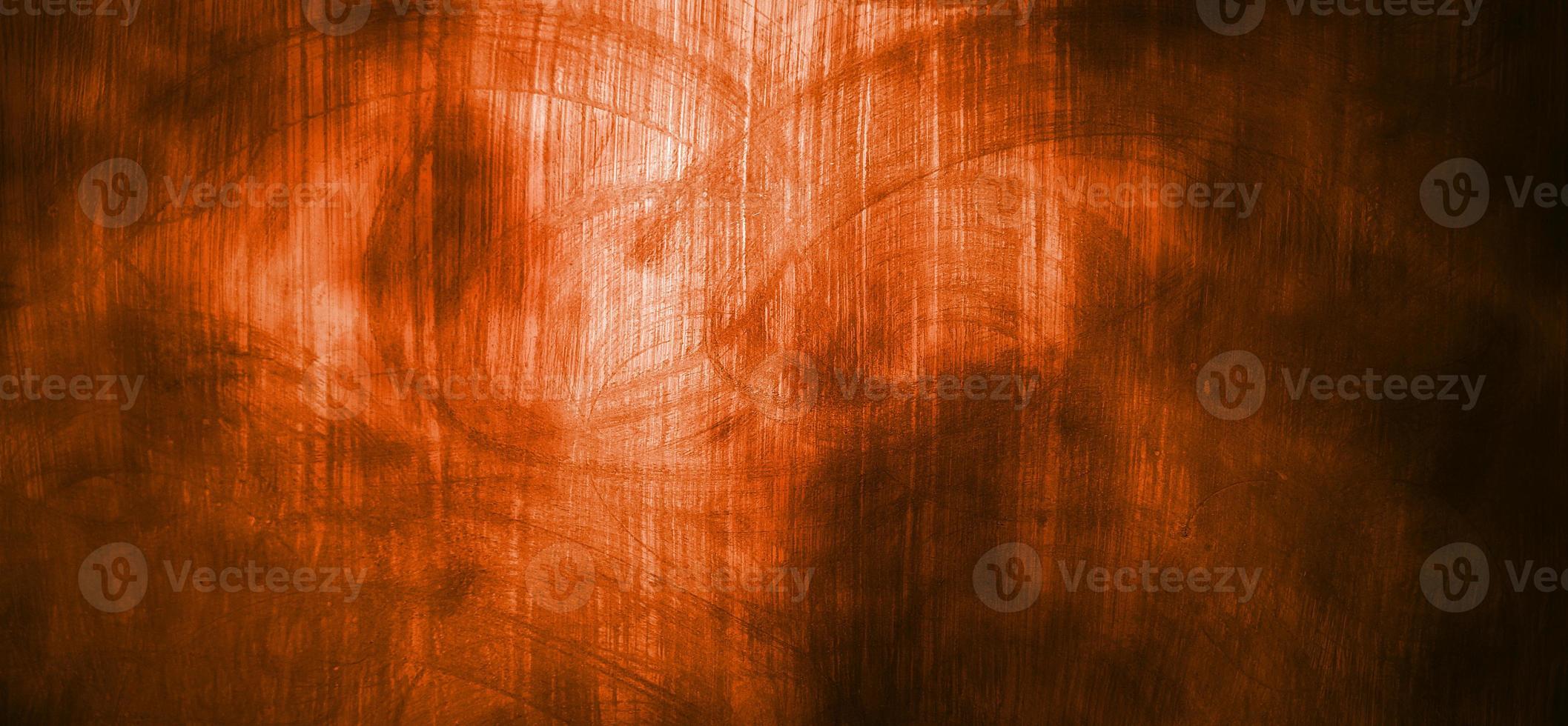 Orange wall with dark shadows. Dark orange cement for the background photo