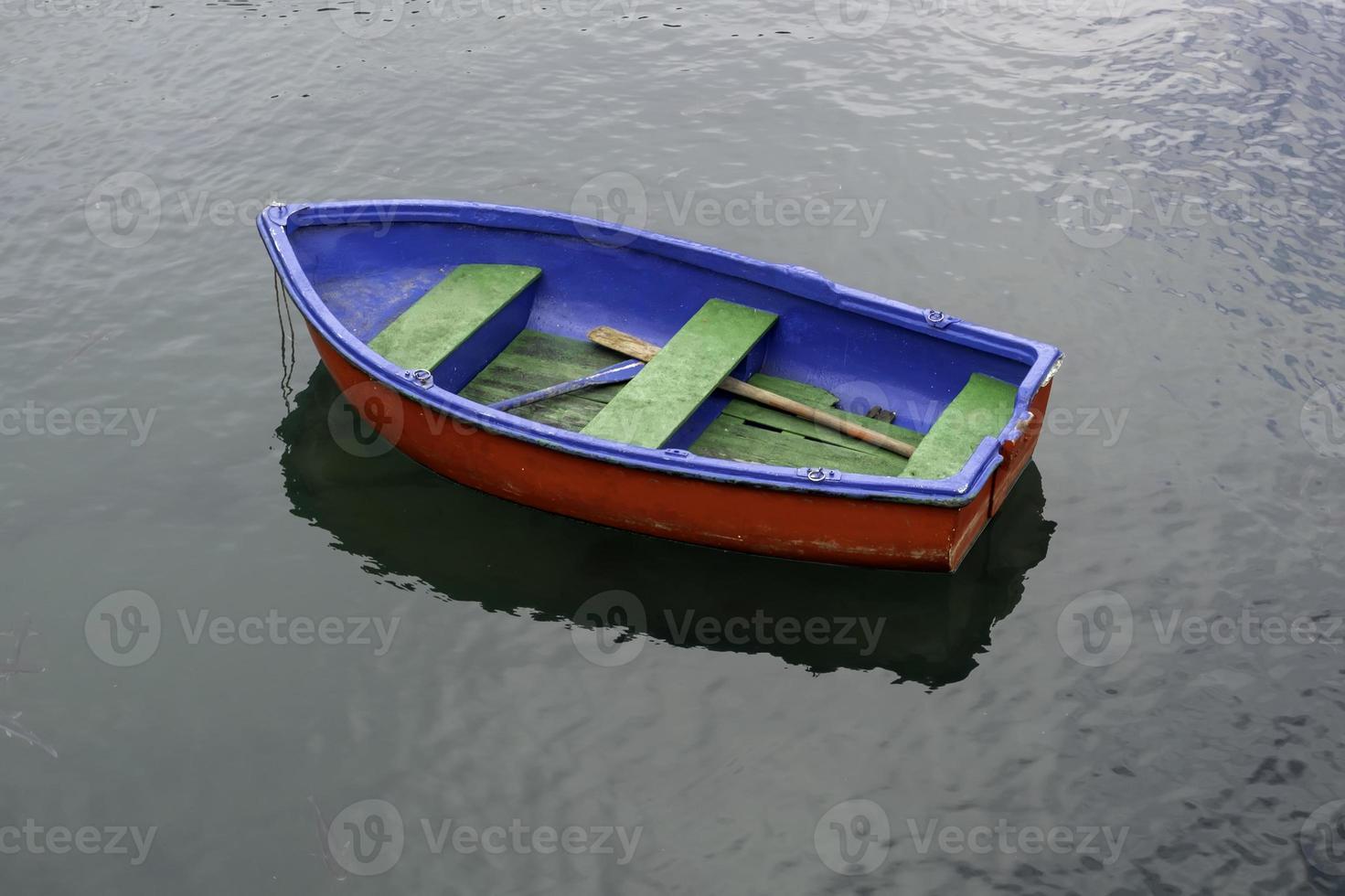 Old lonely wooden boat photo