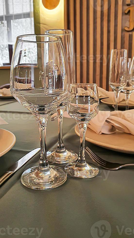 Festive table setting in the restaurant. Wedding preparations. Selective focus. photo