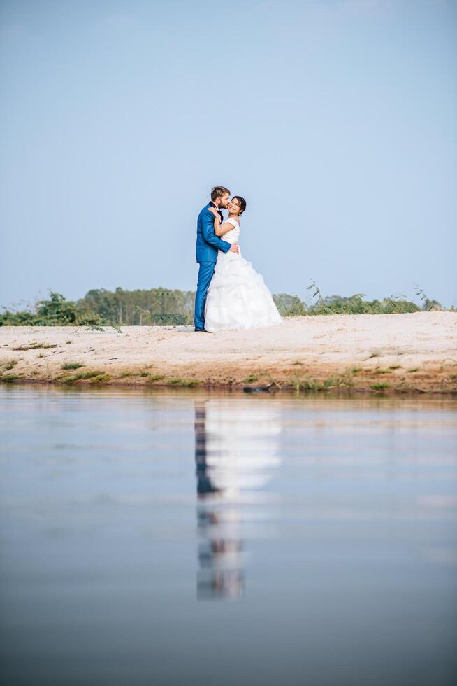 Asian bride and Caucasian groom have romance time and happy together photo