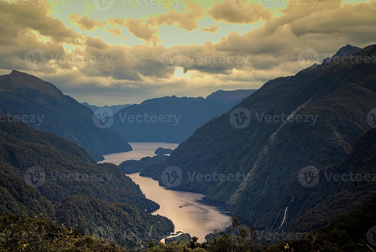 lake hidden by the mountains photo