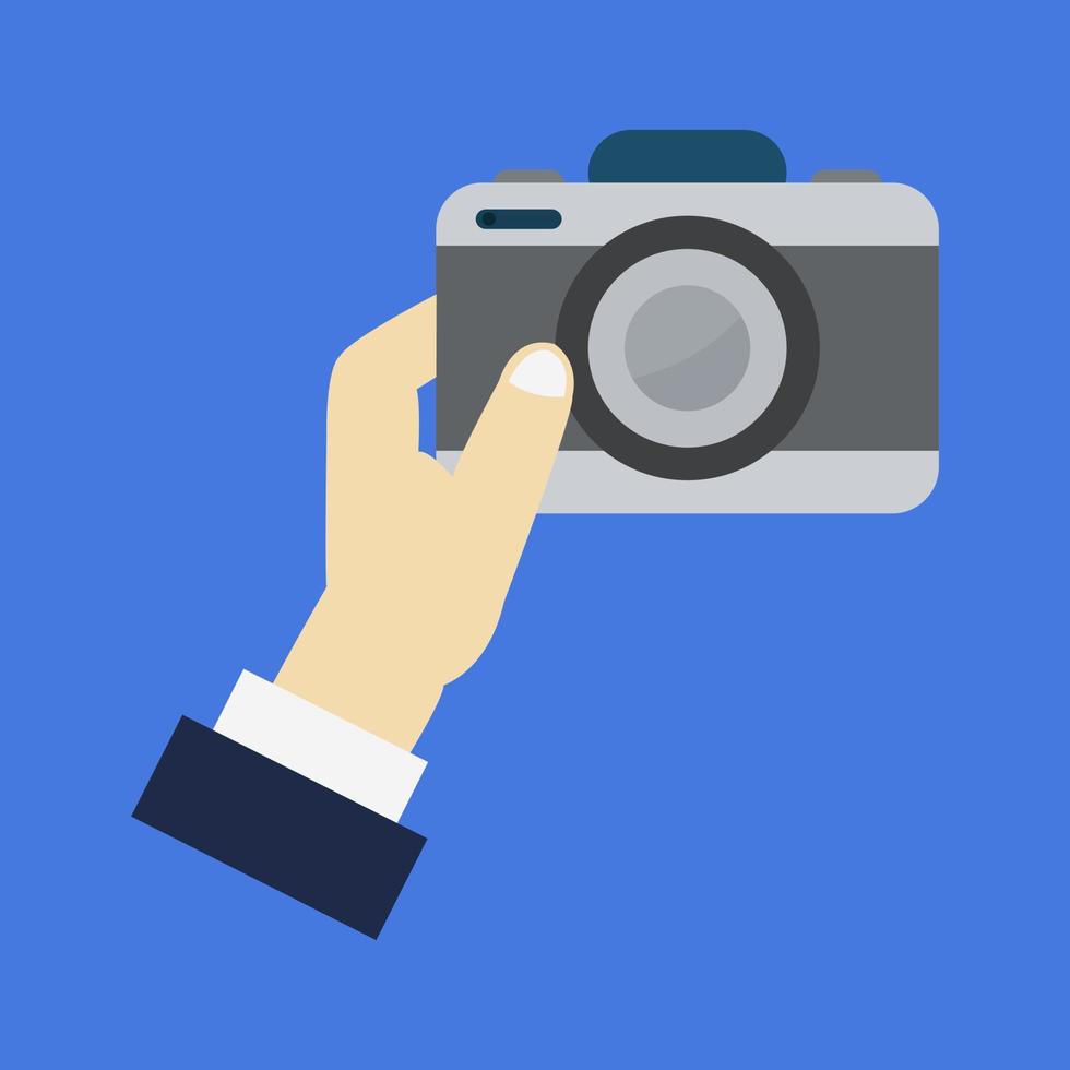 Camera in hand vector