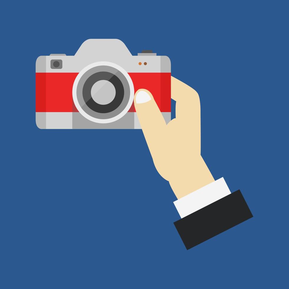 Camera in hand vector