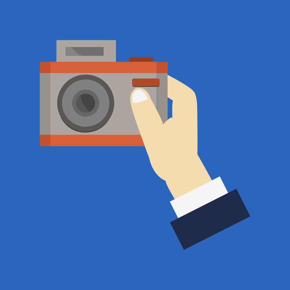 Camera in hand vector