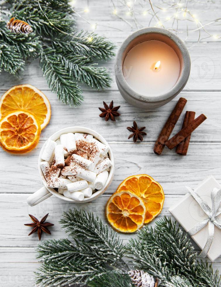 Christmas composition with hot chocolate and decorations photo