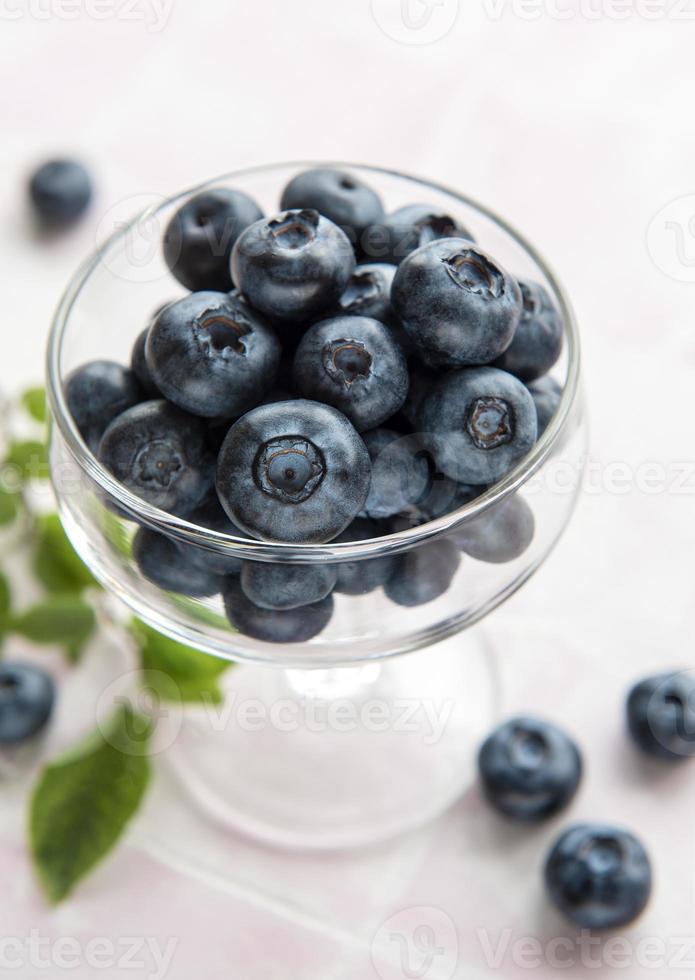 Blueberries on tile background photo