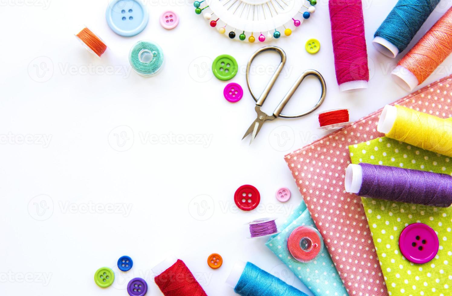 Sewing accessories on a white background photo