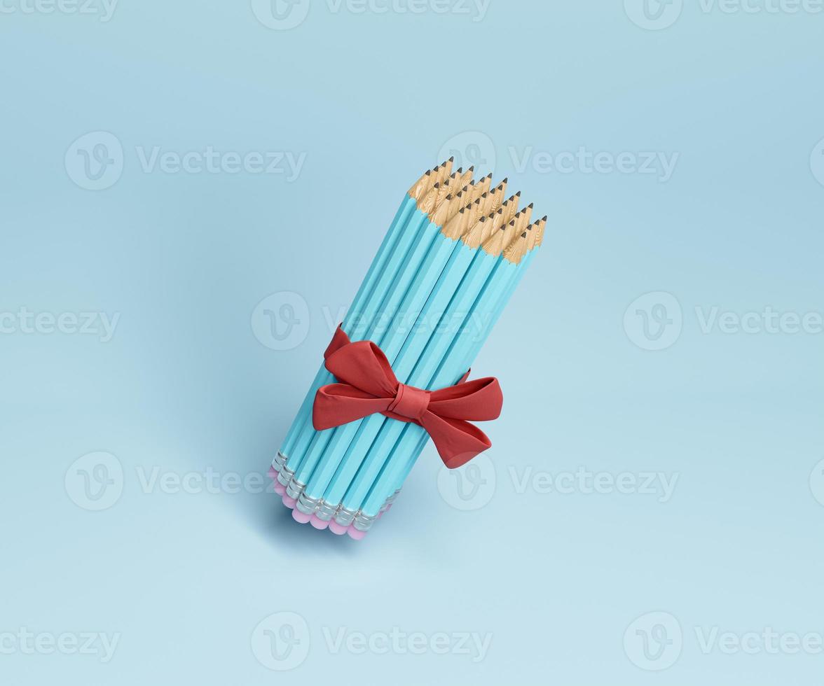 pencils decorated with red gift ribbon photo