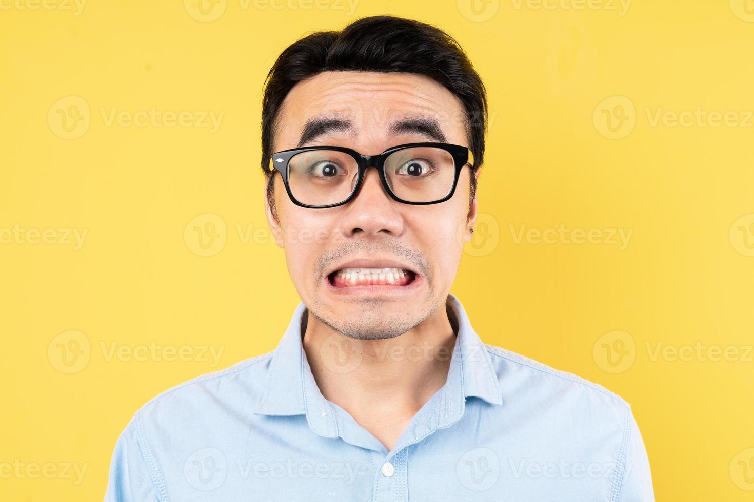 male portrait wearing shirt, isolated on yellow background photo