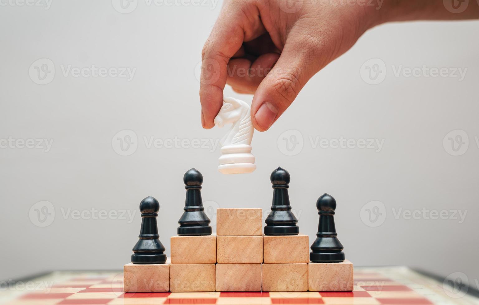 image of chess pieces on a chessboard photo