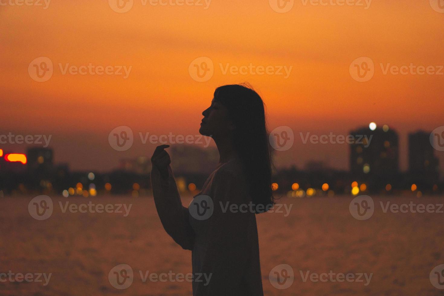 girl silhouette portrait and beautiful sunset photo