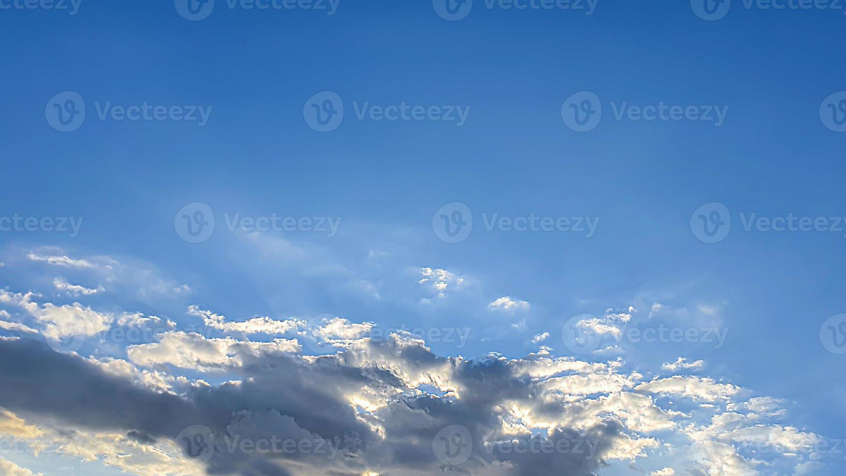 Blue sky with clouds, flying birds and green branches. Summer nature. Road. photo