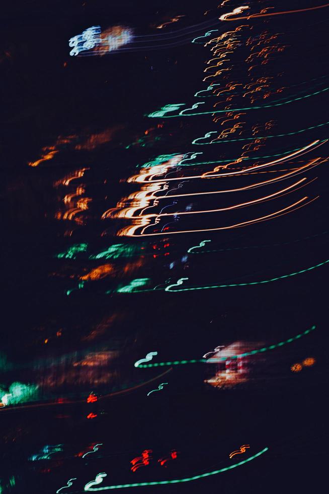 multi colored street lights at night in the city photo