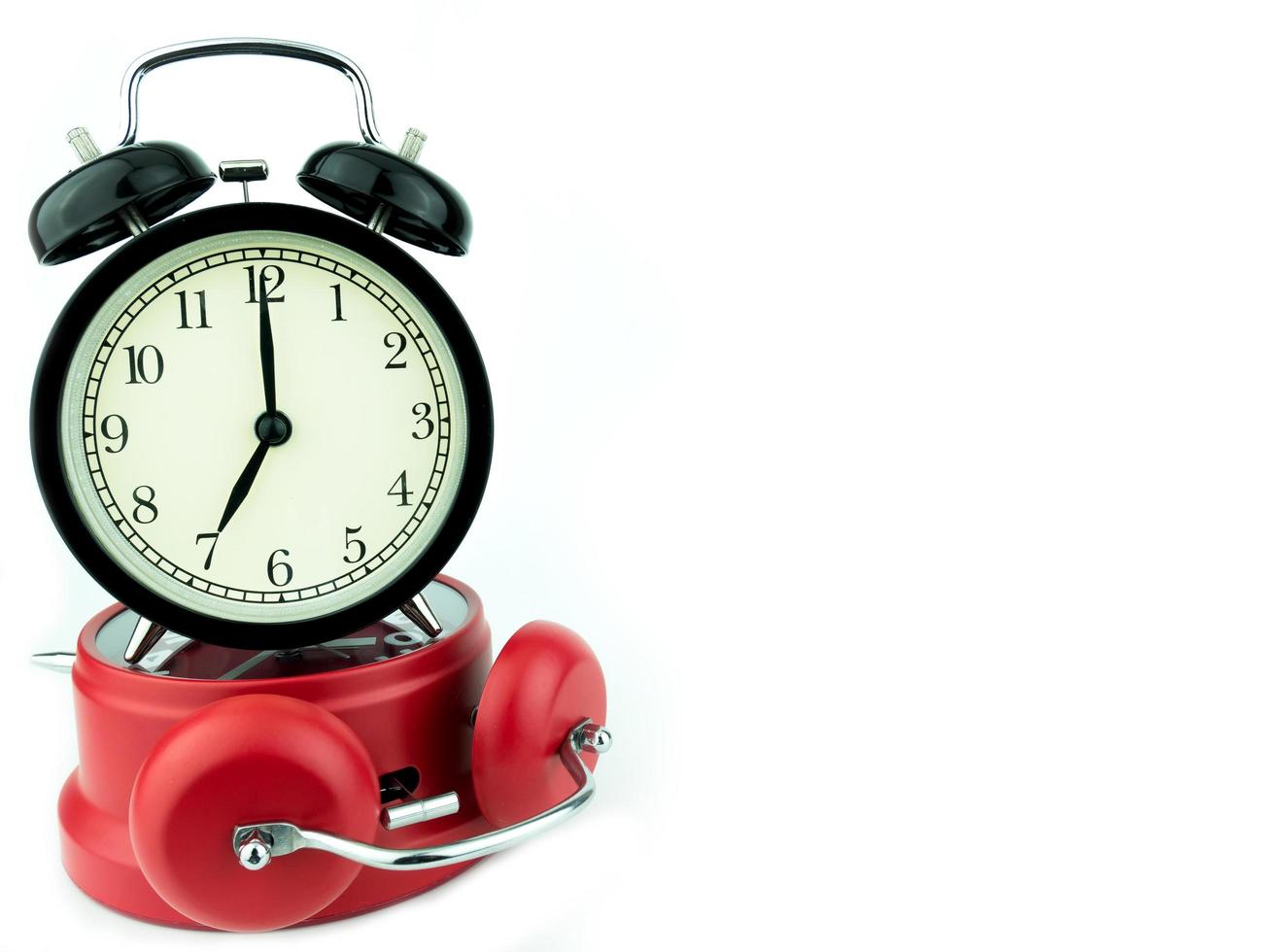 Alarm clock, red, black isolated on white background photo