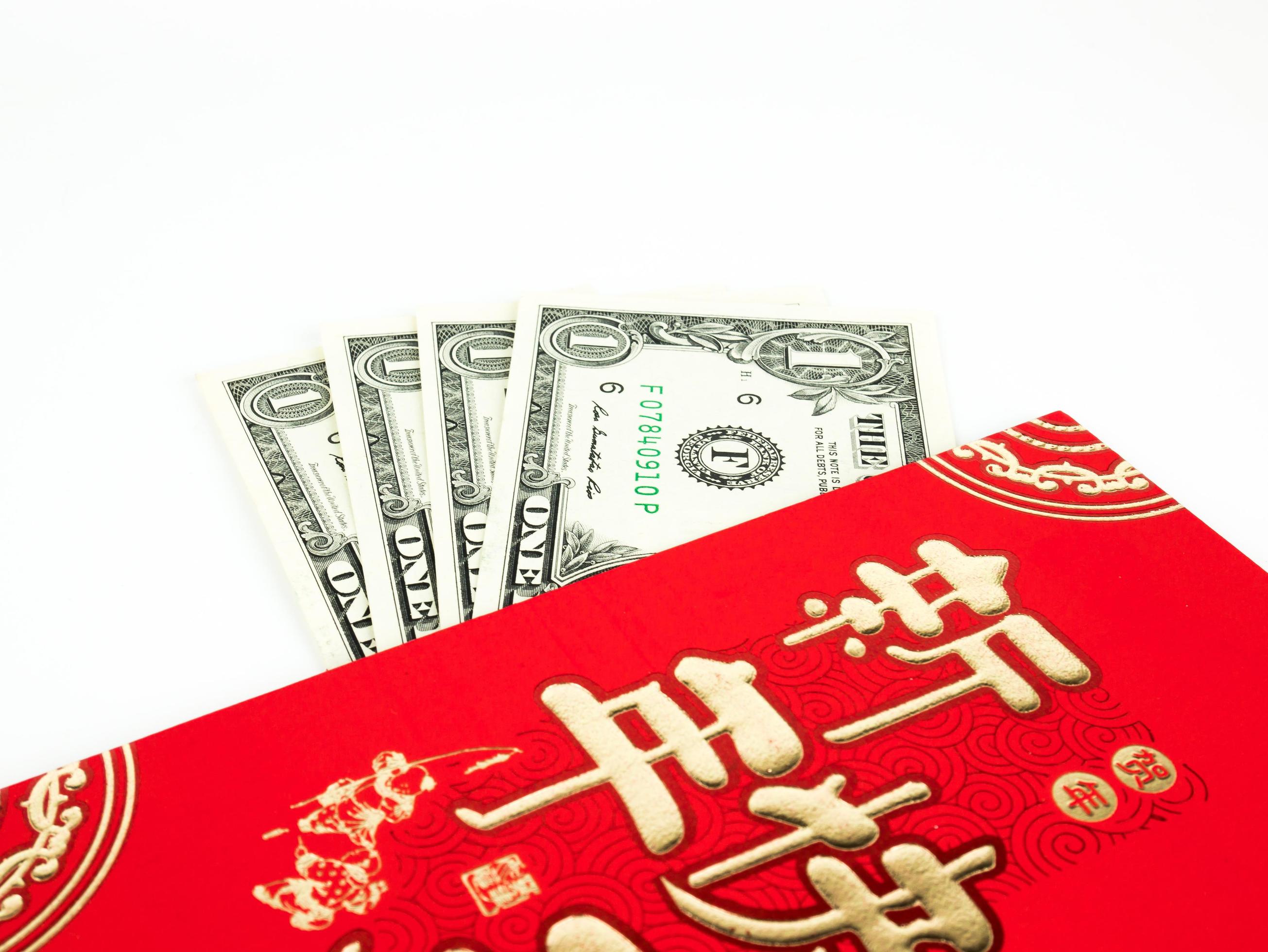 Chinese New Year Money In Red Envelopes Gift On White Background